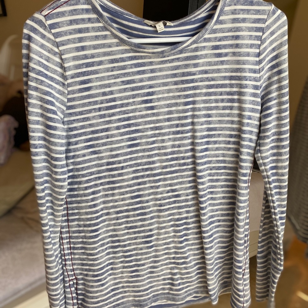 White and blue stripped shirt
